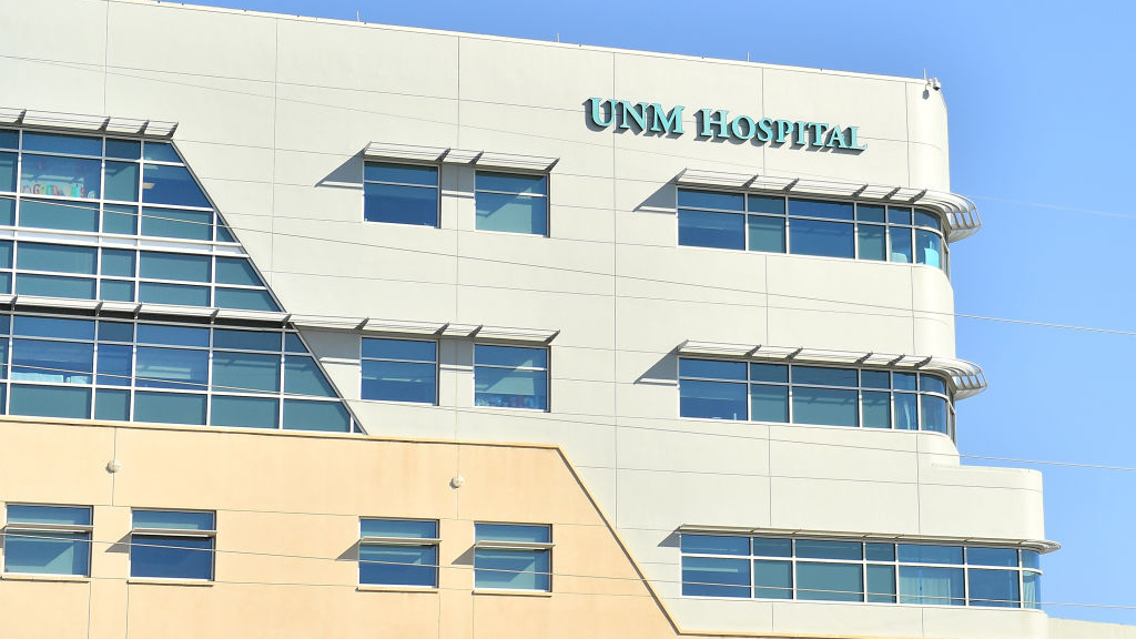 Hospital emergency room with medical staff working during a cyberattack crisis